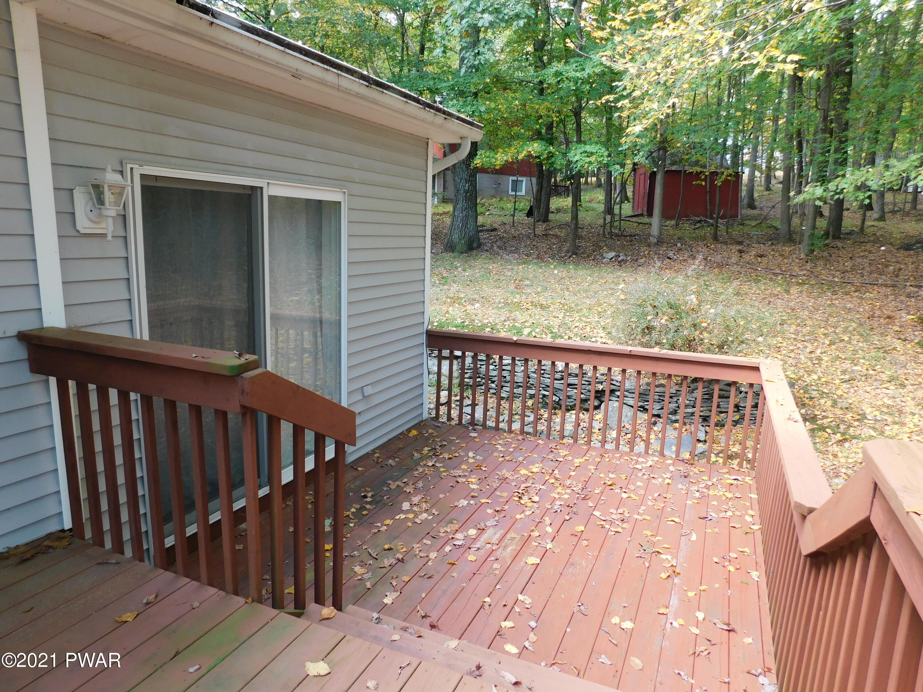119 Ridge Drive Milford, PA 18337 - Photo 9 of 40 a view of a balcony with wooden floor