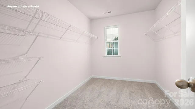 a view of a room that has a window in it