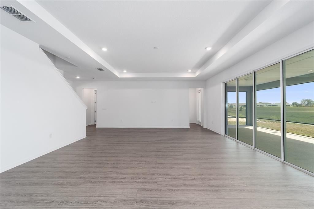 7232 Southwest 63rd Street Ocala, FL 34474 - Photo 16 of 54 a view of an empty room with glass door
