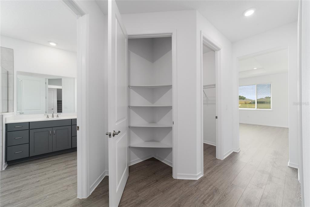 7232 Southwest 63rd Street Ocala, FL 34474 - Photo 27 of 54 a view of an empty room with wooden floor and a window