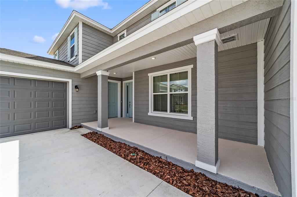 7232 Southwest 63rd Street Ocala, FL 34474 - Photo 3 of 54 a view of a balcony with door