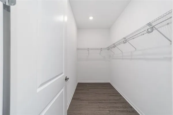 a view of an empty walk in closet