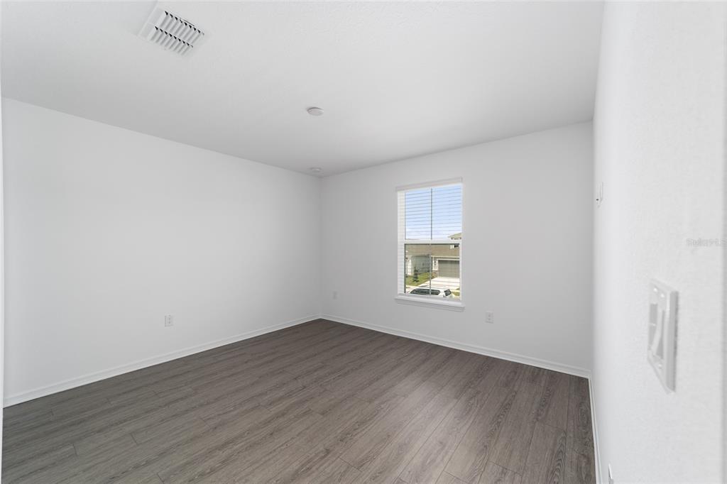 7232 Southwest 63rd Street Ocala, FL 34474 - Photo 48 of 54 an empty room with a window