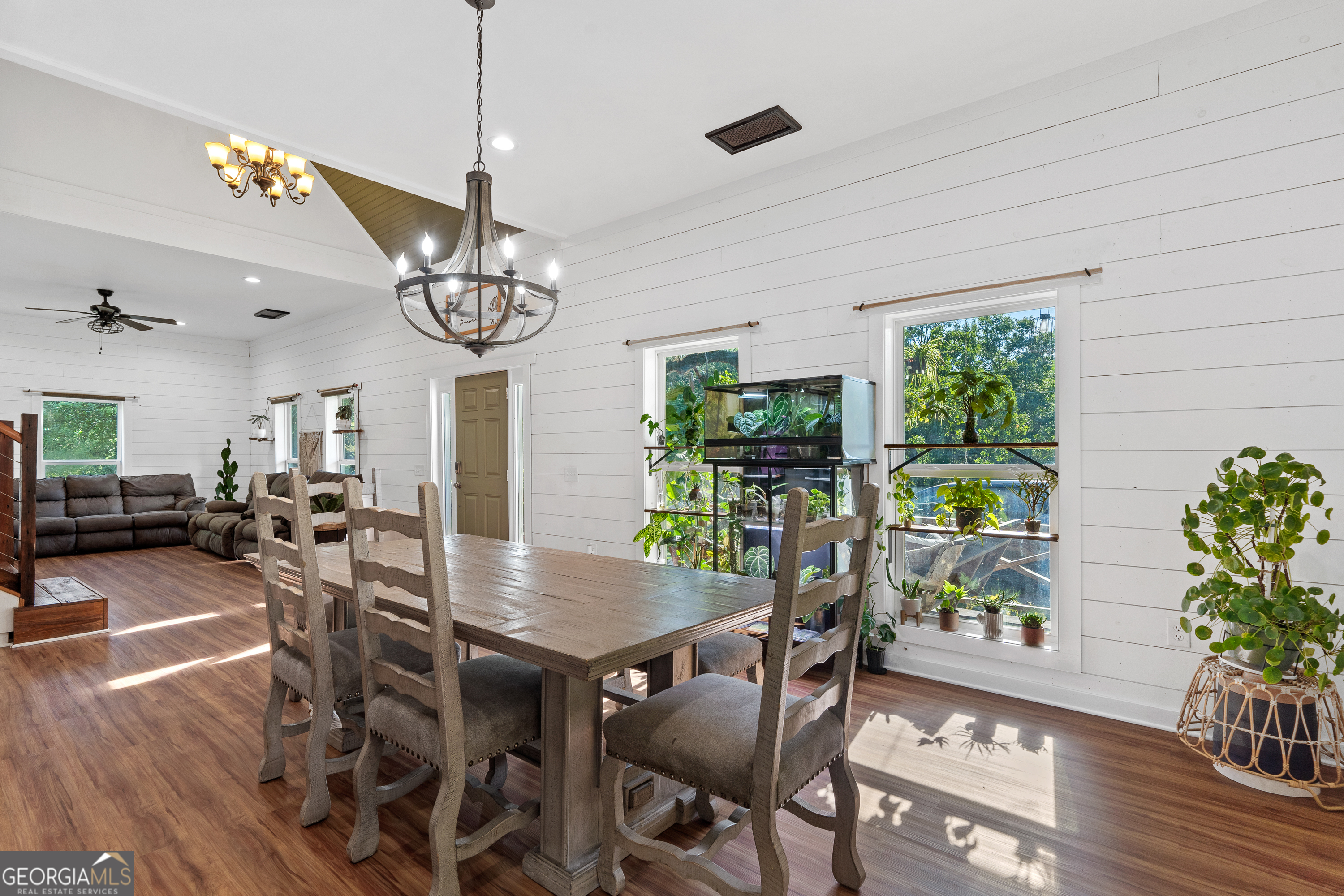 7170 Church Street Bartow, GA 30413 - Photo 16 of 49 a view of a dining room with furniture window and wooden floor