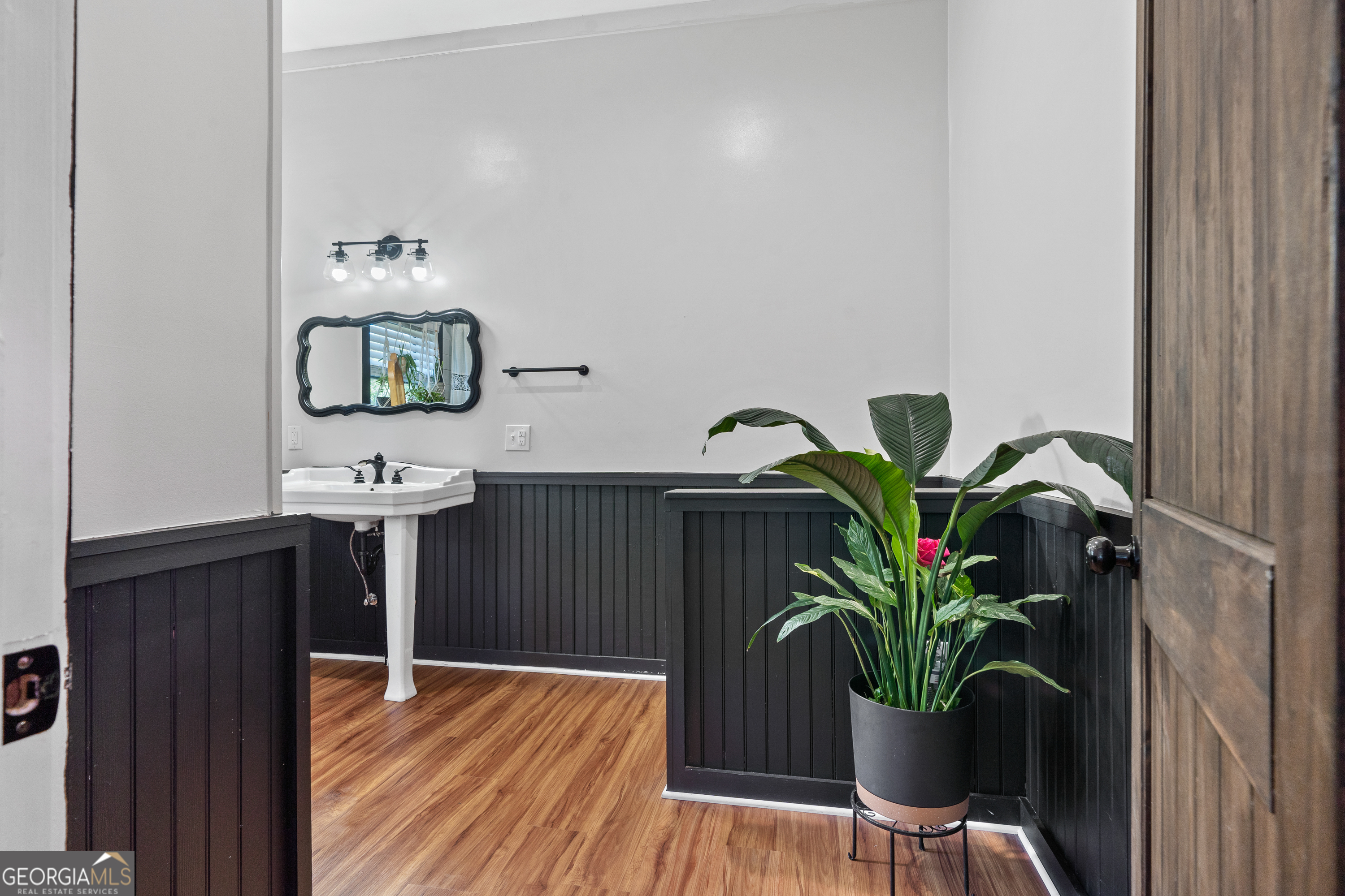 7170 Church Street Bartow, GA 30413 - Photo 29 of 49 a view of a workspace with furniture and wooden floor