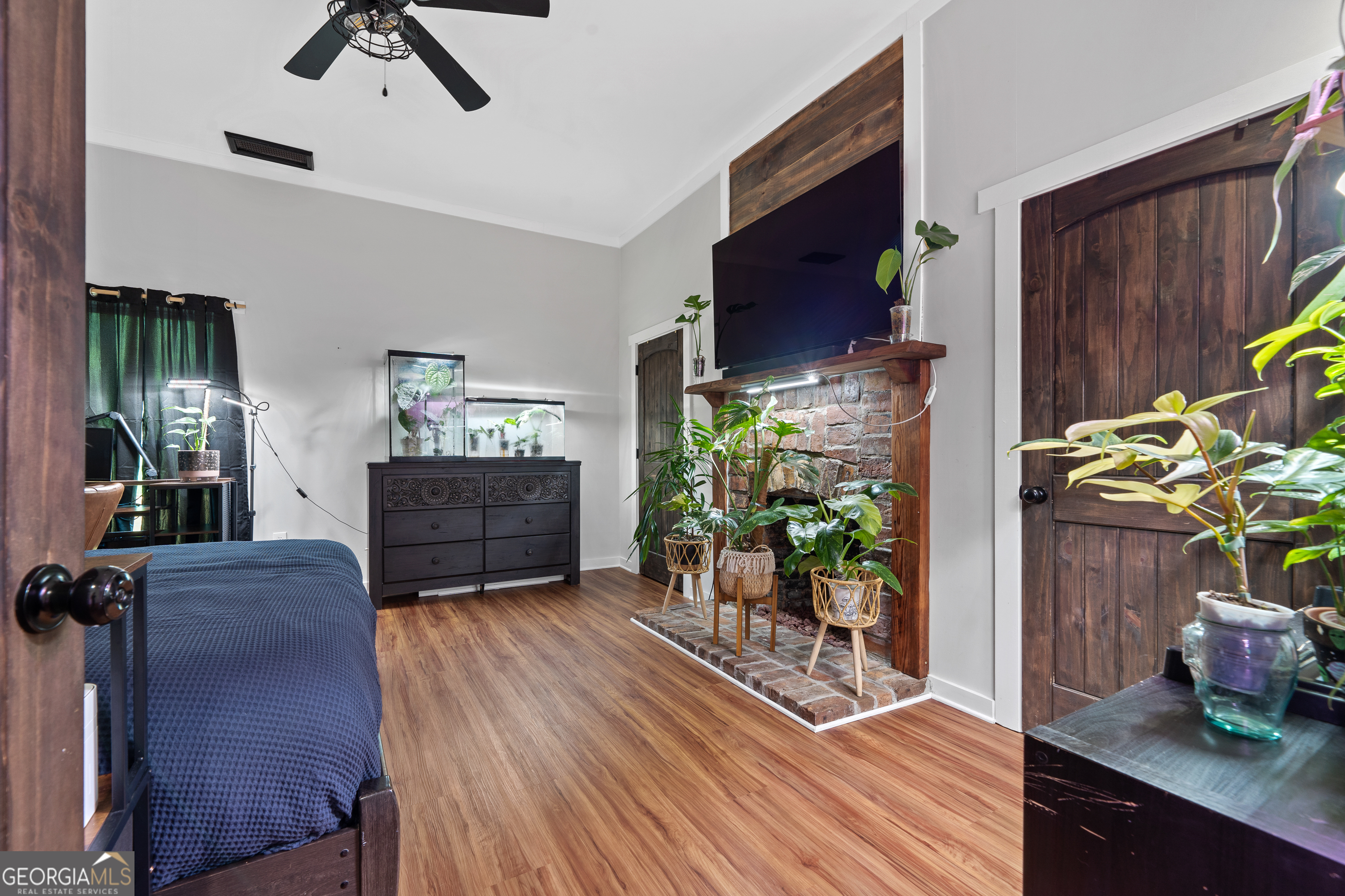 7170 Church Street Bartow, GA 30413 - Photo 30 of 49 a living room with furniture and a potted plant