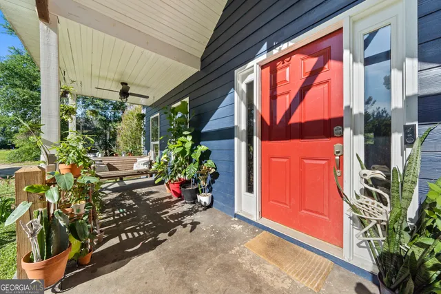 a view of a potted plants in front of a house