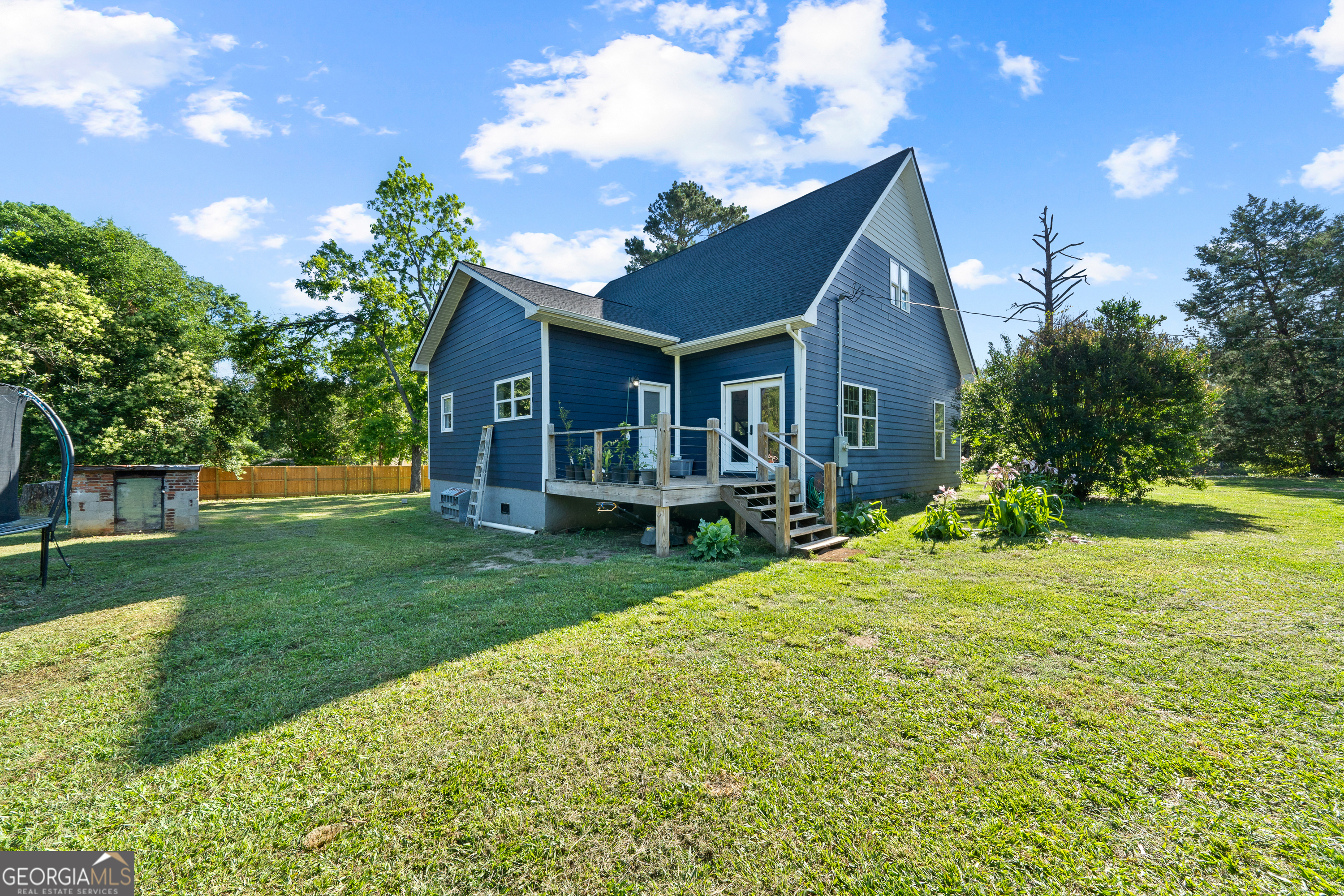 7170 Church Street Bartow, GA 30413 - Photo 45 of 49 a front view of house with yard and green space