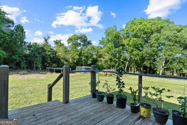 a view of a balcony with chairs