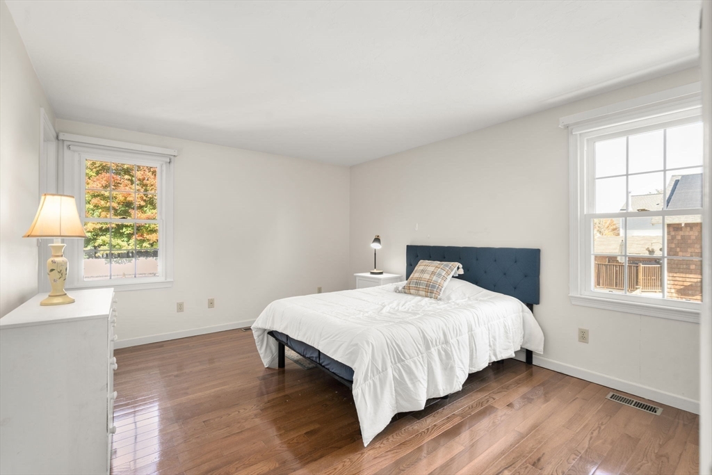 154 Danforth Street Framingham, MA 01701 - Photo 13 of 30 a bedroom with a bed and a window