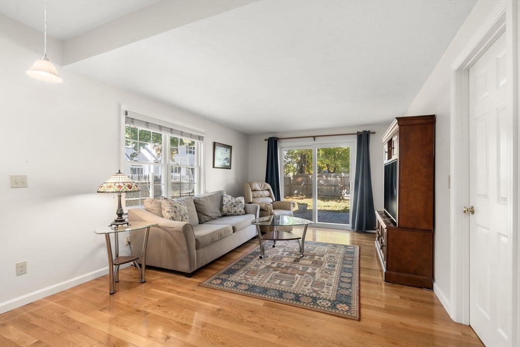 154 Danforth Street Framingham, MA 01701 - Photo 21 of 30 a living room with furniture and a window