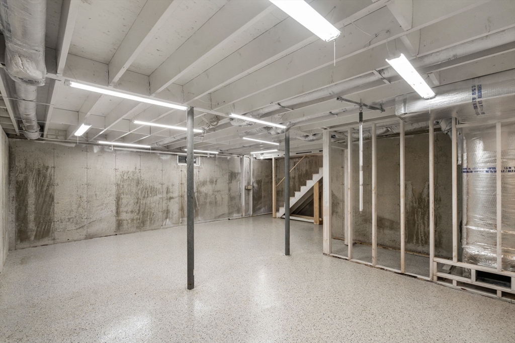 154 Danforth Street Framingham, MA 01701 - Photo 25 of 30 a view of an empty room with wooden frame