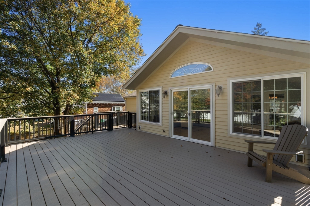 154 Danforth Street Framingham, MA 01701 - Photo 28 of 30 a view of a roof deck with wooden floor and seating space