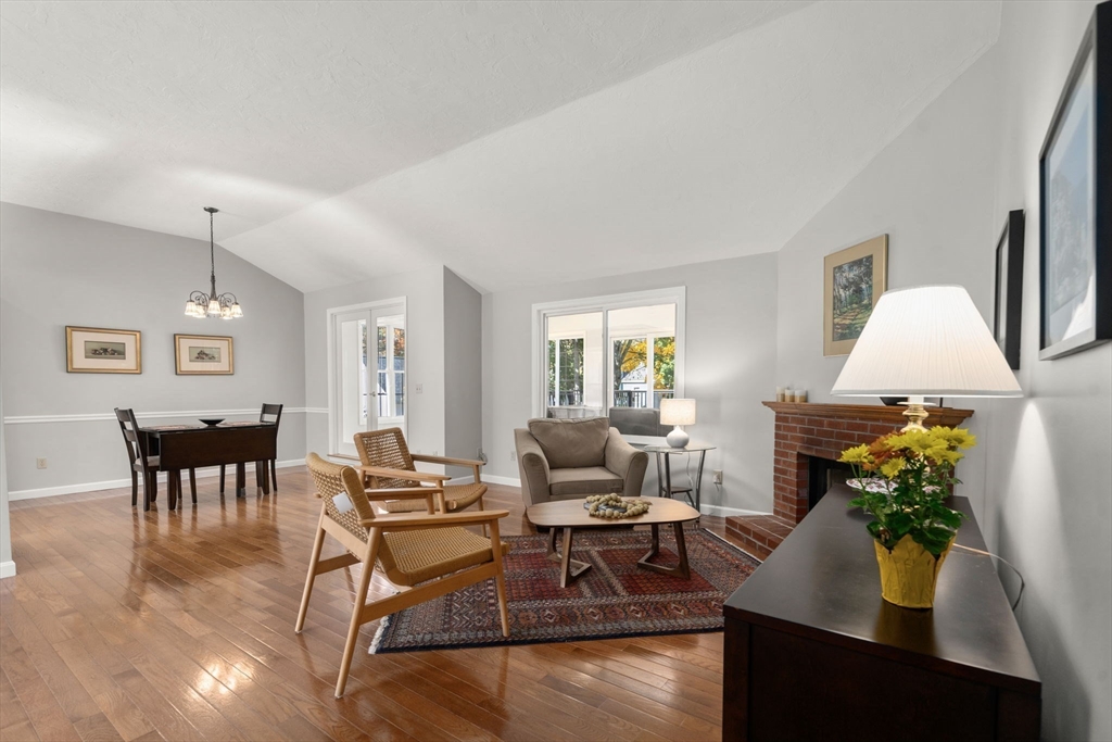 154 Danforth Street Framingham, MA 01701 - Photo 3 of 30 a living room with furniture and wooden floor