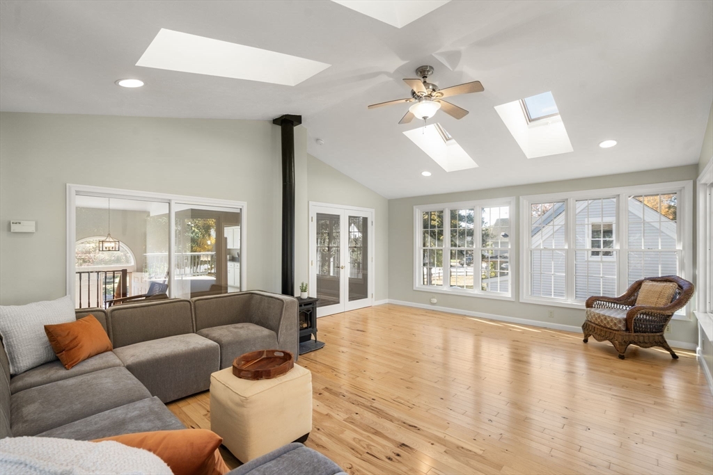 154 Danforth Street Framingham, MA 01701 - Photo 8 of 30 a living room with furniture and large windows
