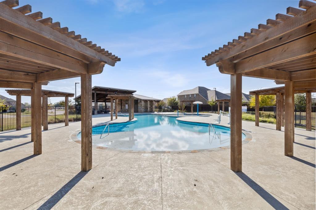 5513 Berea Street Forney, TX 75126 - Photo 26 of 29 Neighborhood pool with shade cabanas