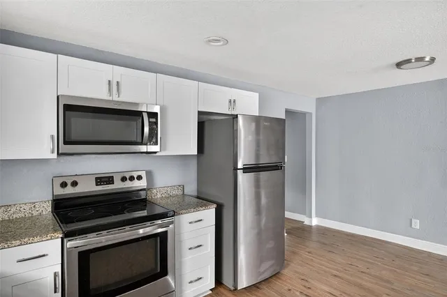 a front view of a house with a tub