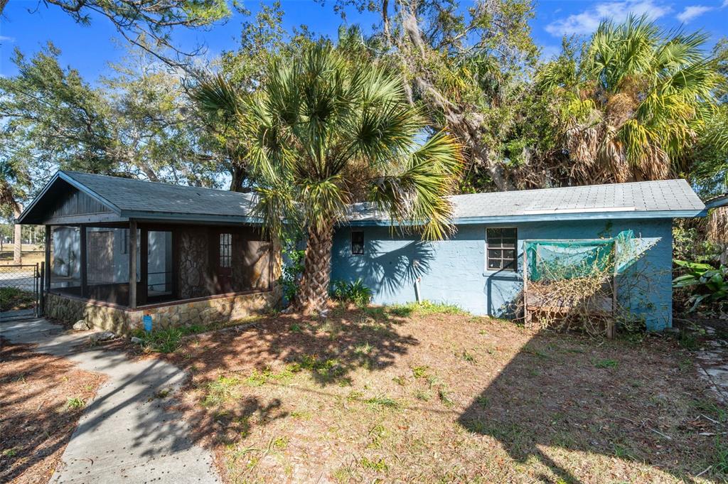 5801 Virginia Avenue New Port Richey, FL 34652 - Photo 46 of 81 a view of a house with a yard