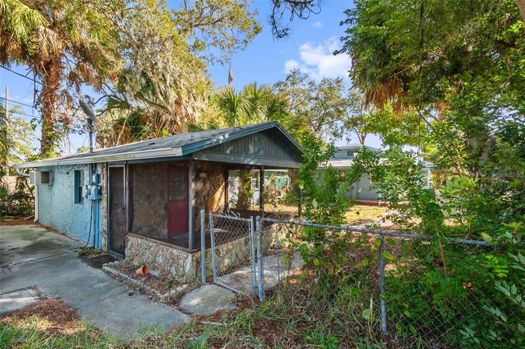 5801 Virginia Avenue New Port Richey, FL 34652 - Photo 48 of 81 a view of a house with a tree