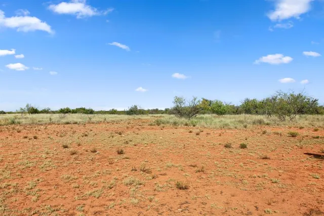 a view of lake with sunset