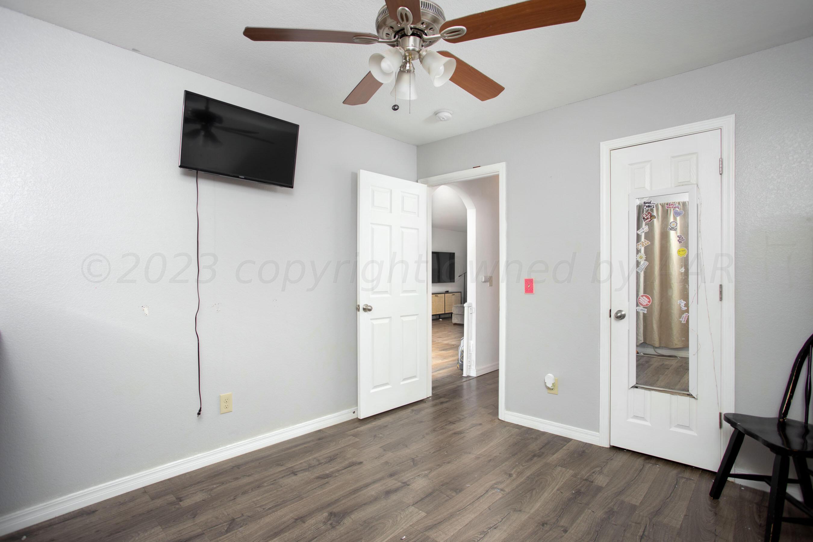 4511 South Roberts Street Amarillo, TX 79118 - Photo 20 of 26 a view of a livingroom with a flat screen tv