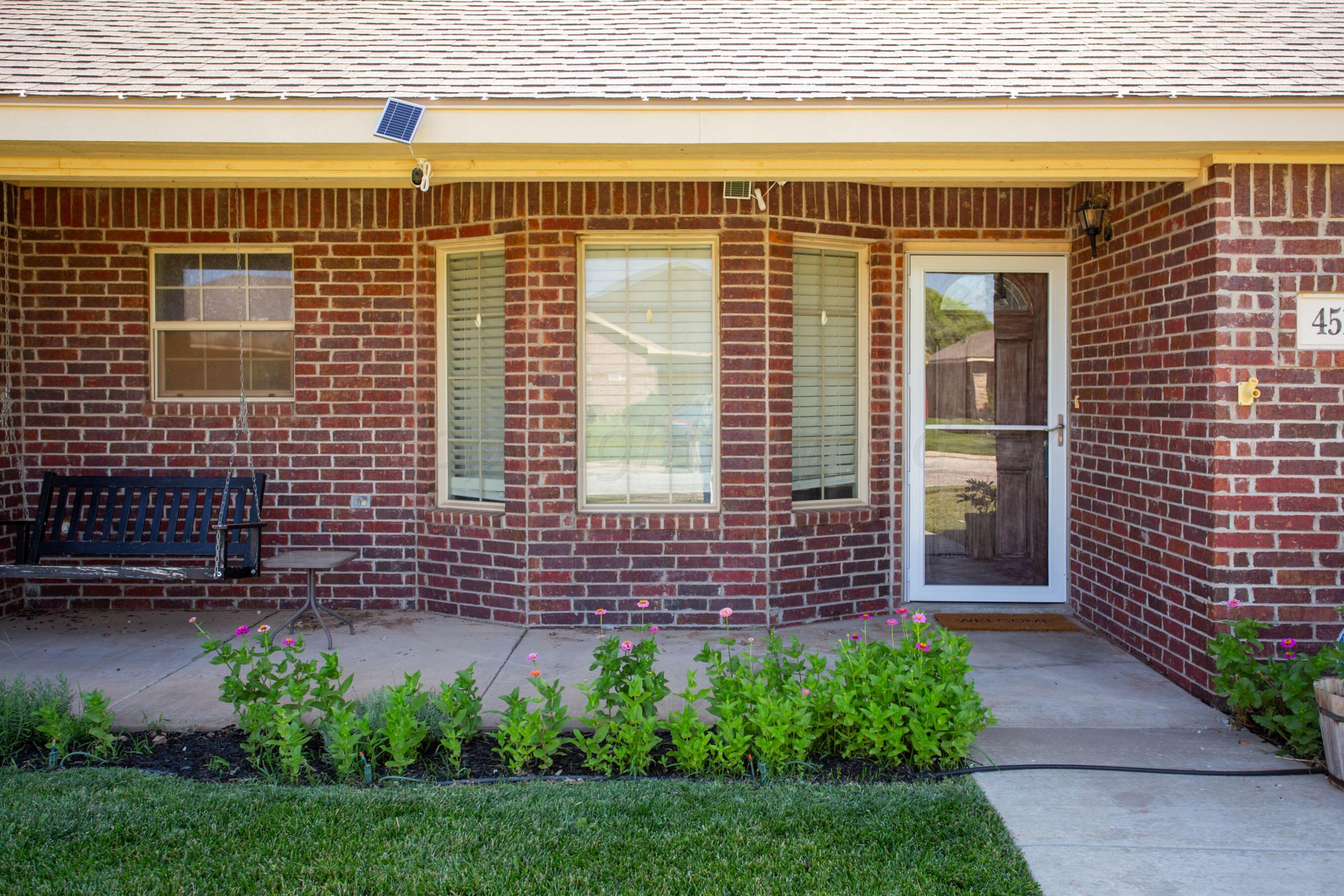 4511 South Roberts Street Amarillo, TX 79118 - Photo 2 of 26 a view of front door of house with outdoor space