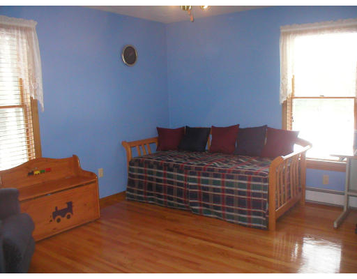 94 Houghton's Mill Road Lunenburg, MA 01462 - Photo 8 of 14 a bedroom with a bed and a window