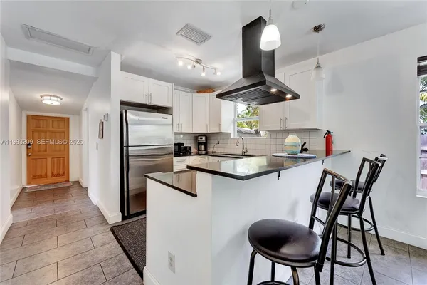 $2,499 | 107 Stirling Road, Dania Beach, FL 33004