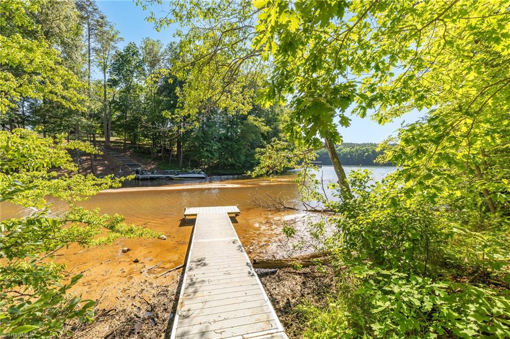 7289 Plunkett Road Stokesdale, NC 27357 - Photo 25 of 27 Lake access from boathouse
