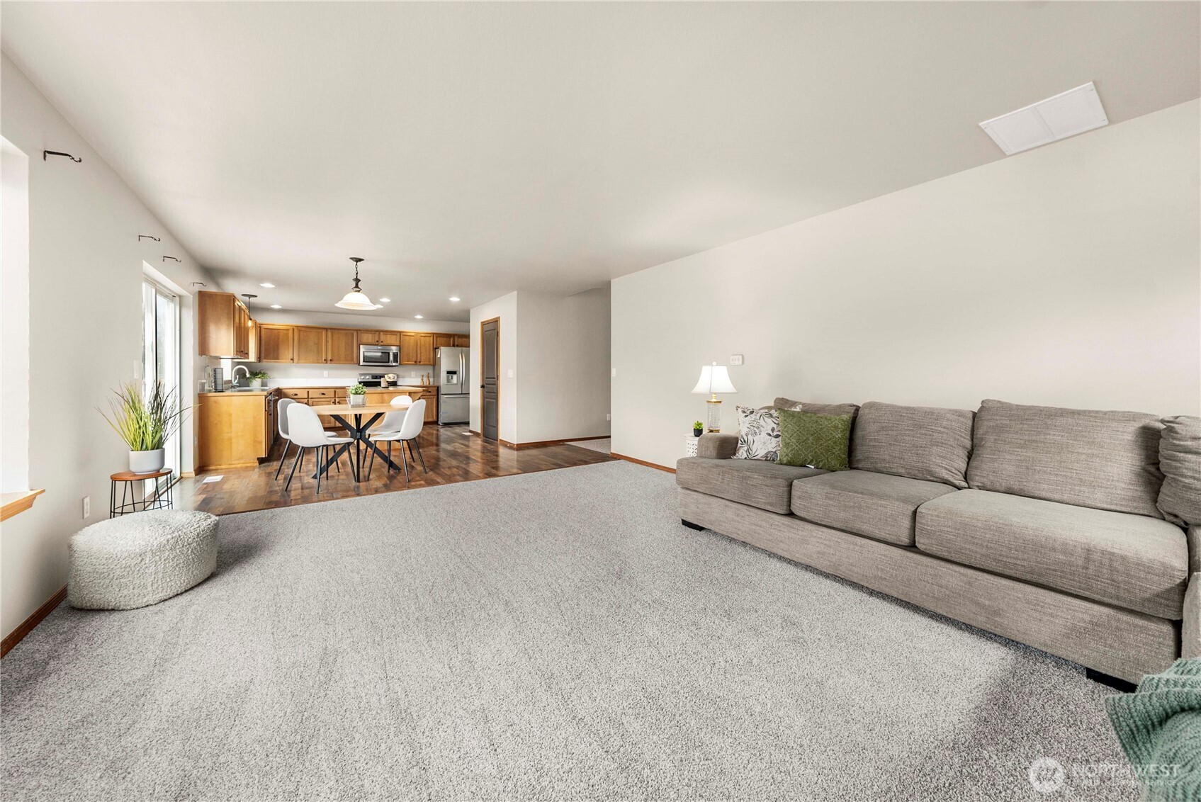 1503 Riddell Avenue Northeast Orting, WA 98360 - Photo 11 of 40 a living room with furniture and white walls