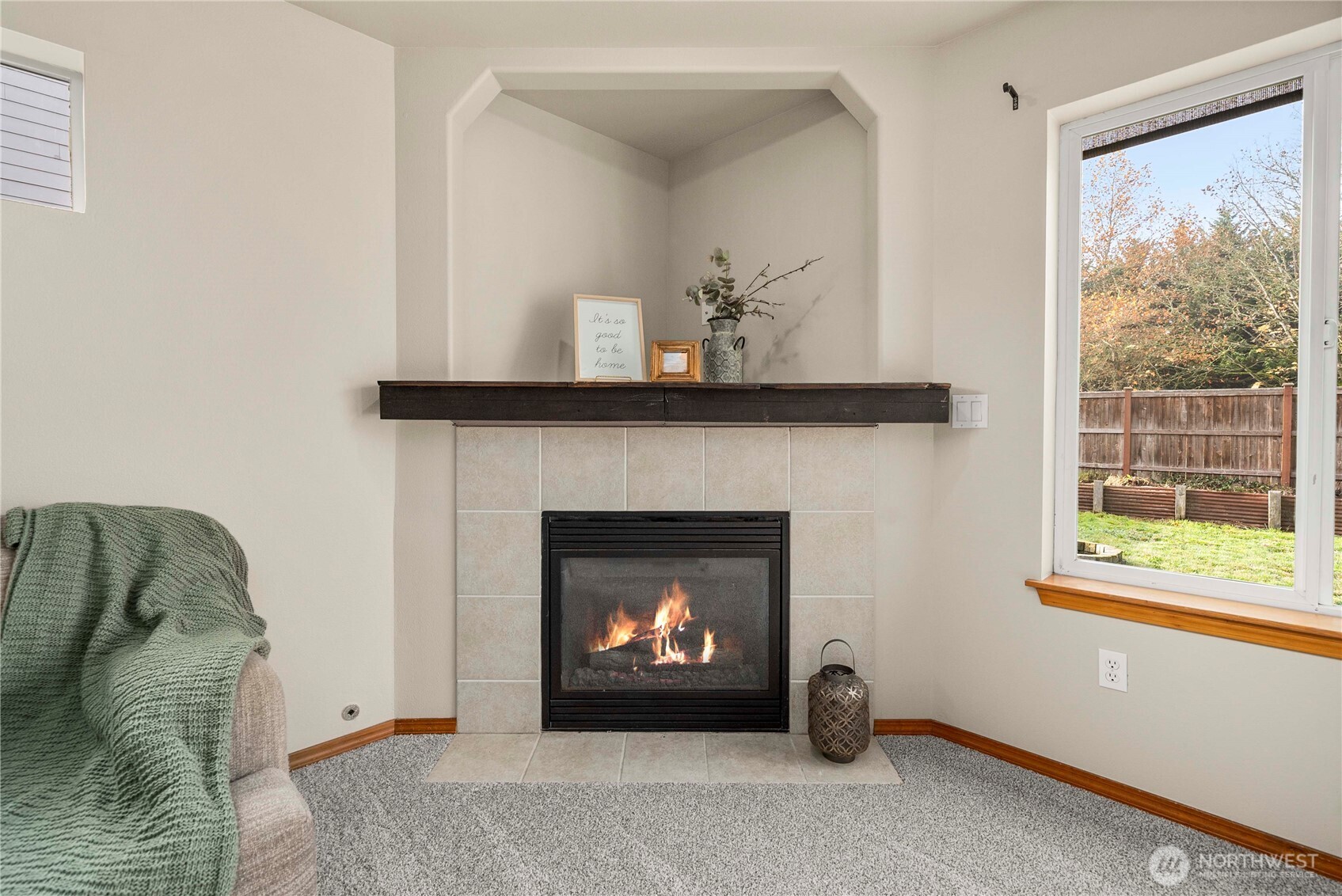 1503 Riddell Avenue Northeast Orting, WA 98360 - Photo 17 of 40 a living room with furniture and a fireplace