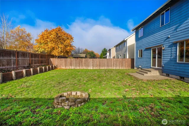 a backyard of a house with lots of green space