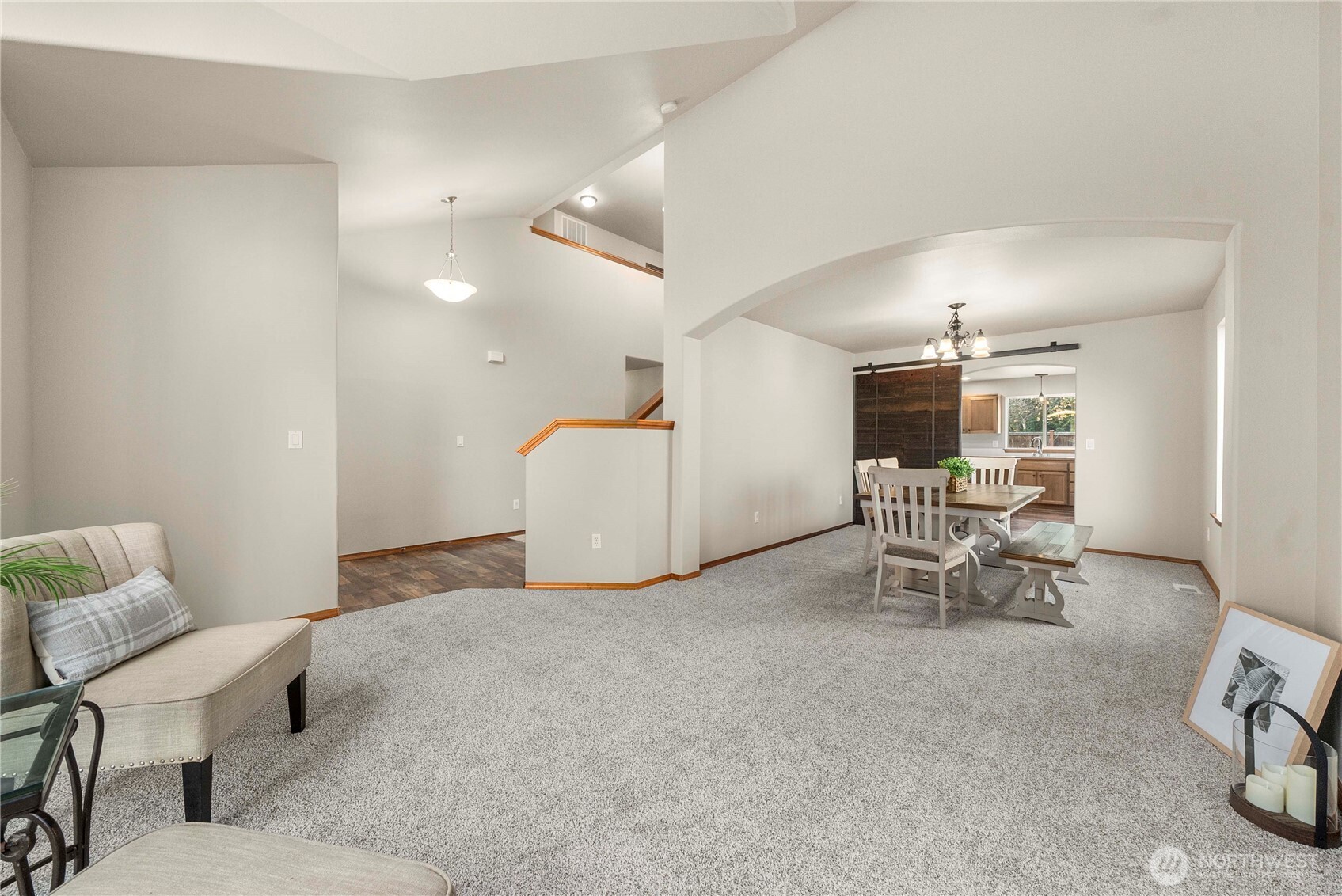 1503 Riddell Avenue Northeast Orting, WA 98360 - Photo 10 of 40 a living room with furniture and a table