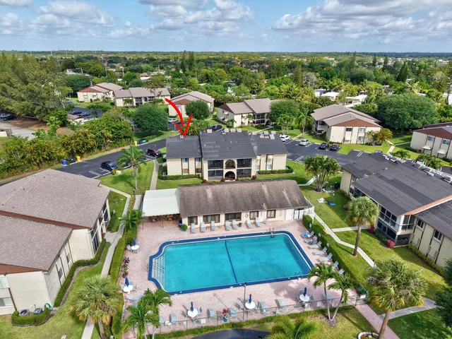 an aerial view of a house with a garden