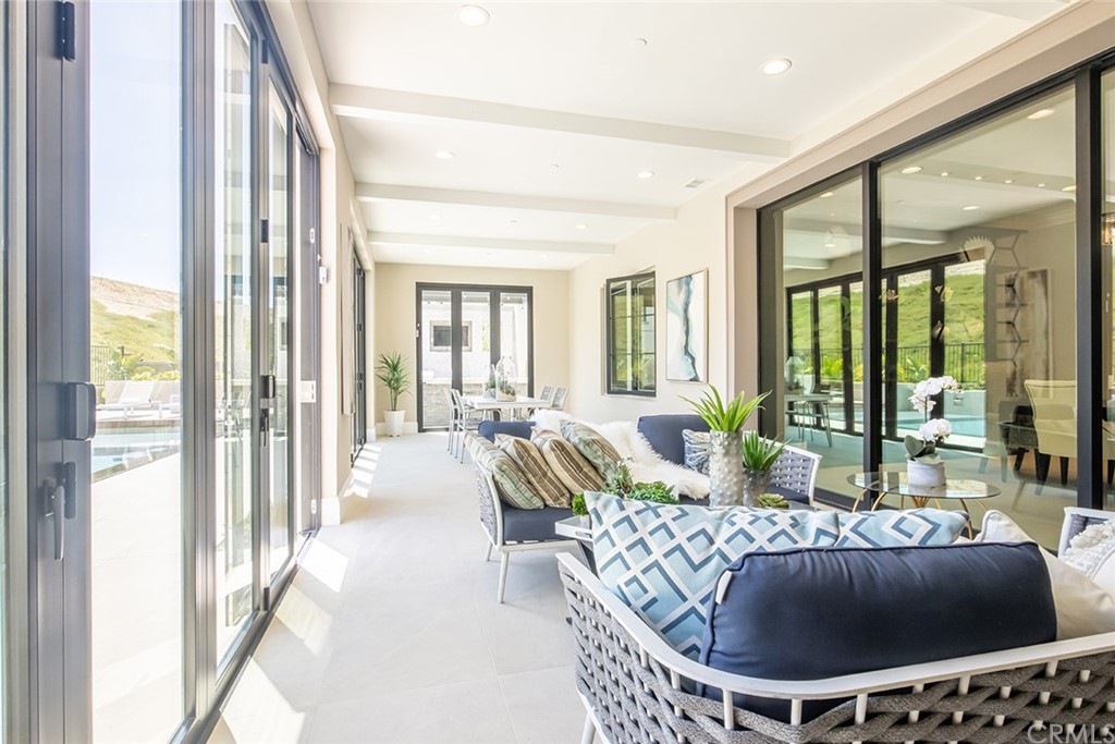 124 Panorama Irvine, CA 92618 - Photo 22 of 61 a living room with furniture and a large window