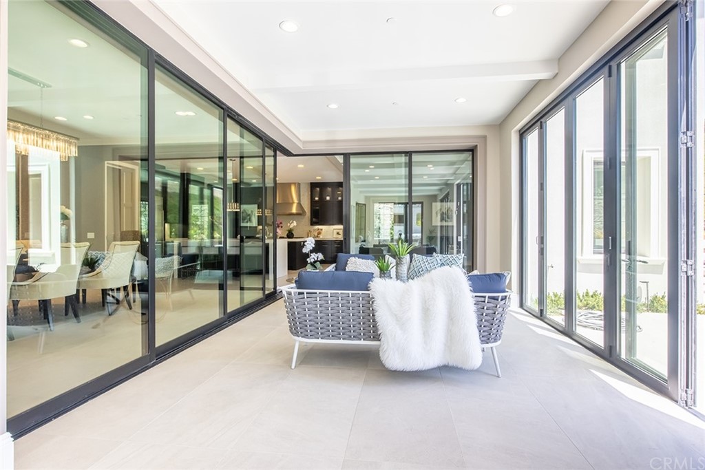 124 Panorama Irvine, CA 92618 - Photo 25 of 61 a living room with furniture and a large window