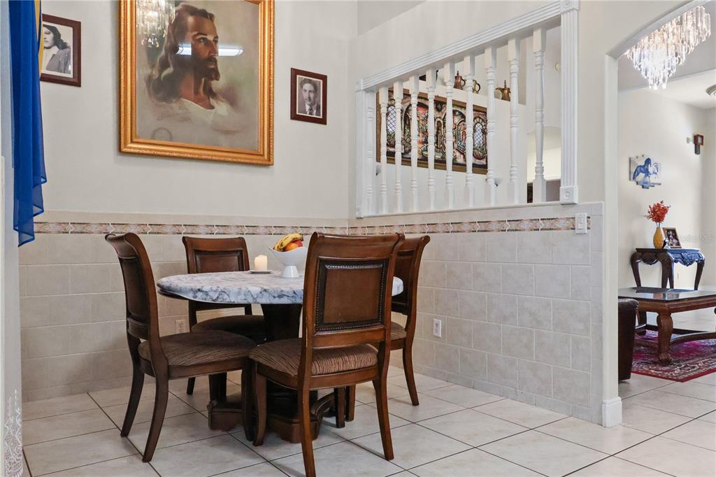 1 Elder Place Palm Coast, FL 32164 - Photo 13 of 34 a view of a dining room with furniture