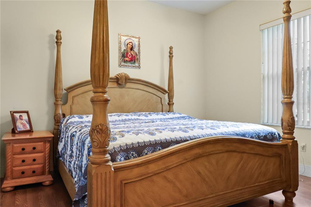1 Elder Place Palm Coast, FL 32164 - Photo 20 of 34 a bedroom with a bed and a dresser