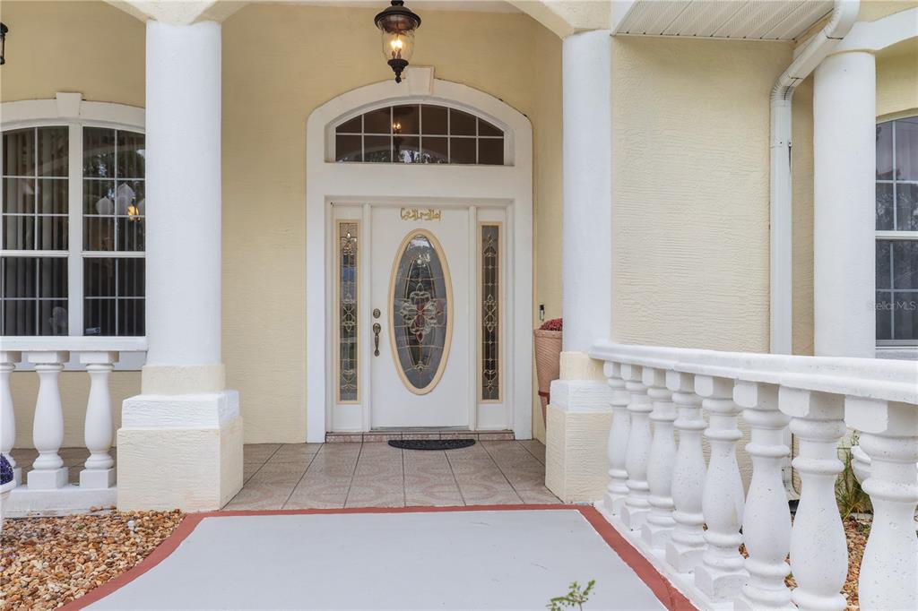 1 Elder Place Palm Coast, FL 32164 - Photo 2 of 34 a view of living room with furniture and baby crib