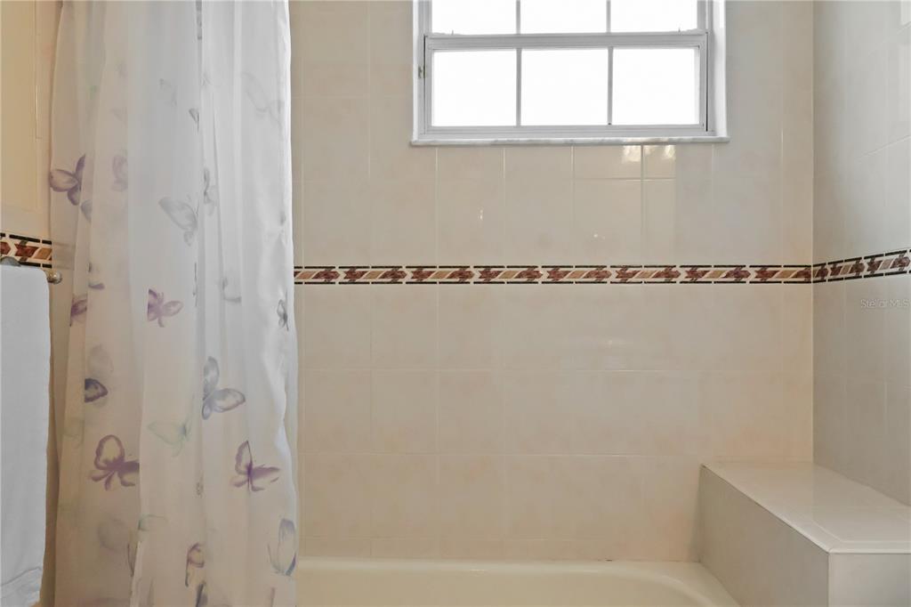 1 Elder Place Palm Coast, FL 32164 - Photo 22 of 34 a bathroom with a shower