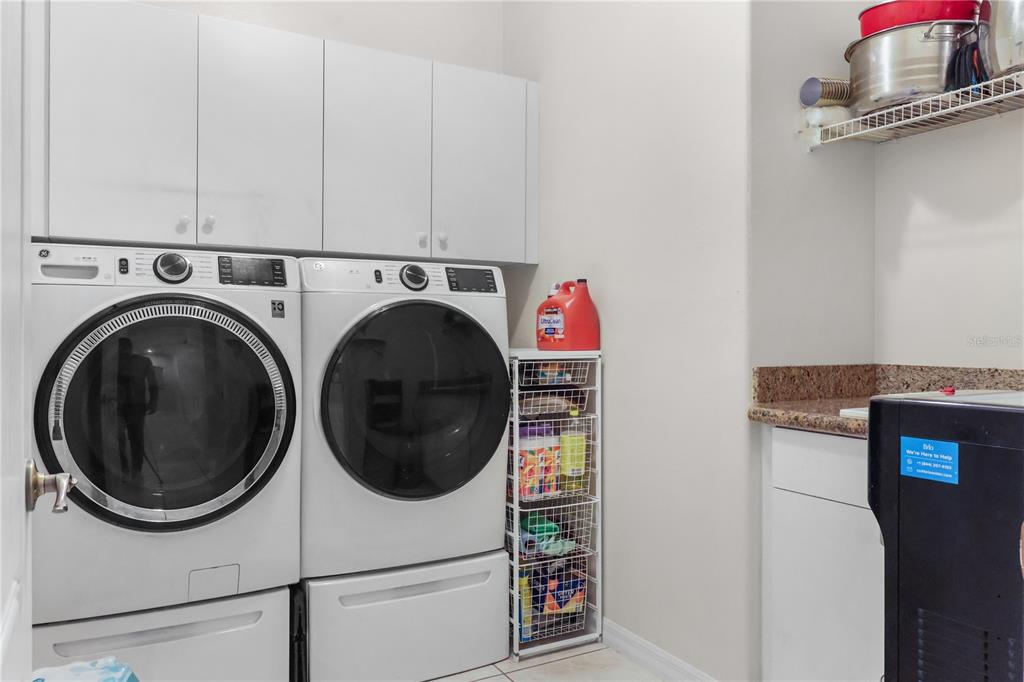 1 Elder Place Palm Coast, FL 32164 - Photo 25 of 34 a utility room with dryer and washer