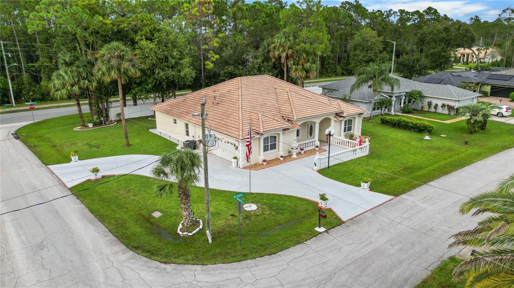 1 Elder Place Palm Coast, FL 32164 - Photo 30 of 34 a aerial view of a house with garden