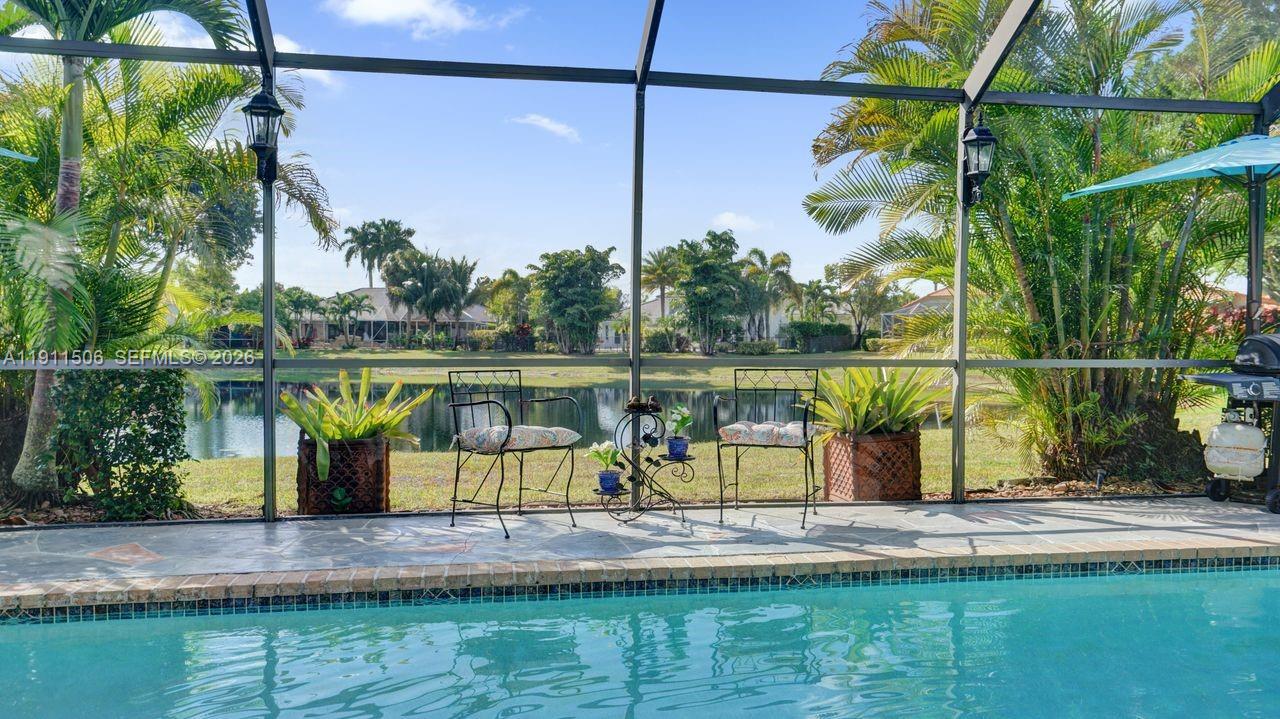 10858 White Aspen Lane Boca Raton, FL 33428 - Photo 2 of 72 a view of a lake with a lake view