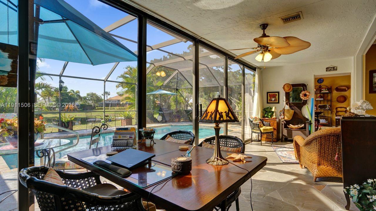 10858 White Aspen Lane Boca Raton, FL 33428 - Photo 24 of 72 a view of a livingroom with furniture and window