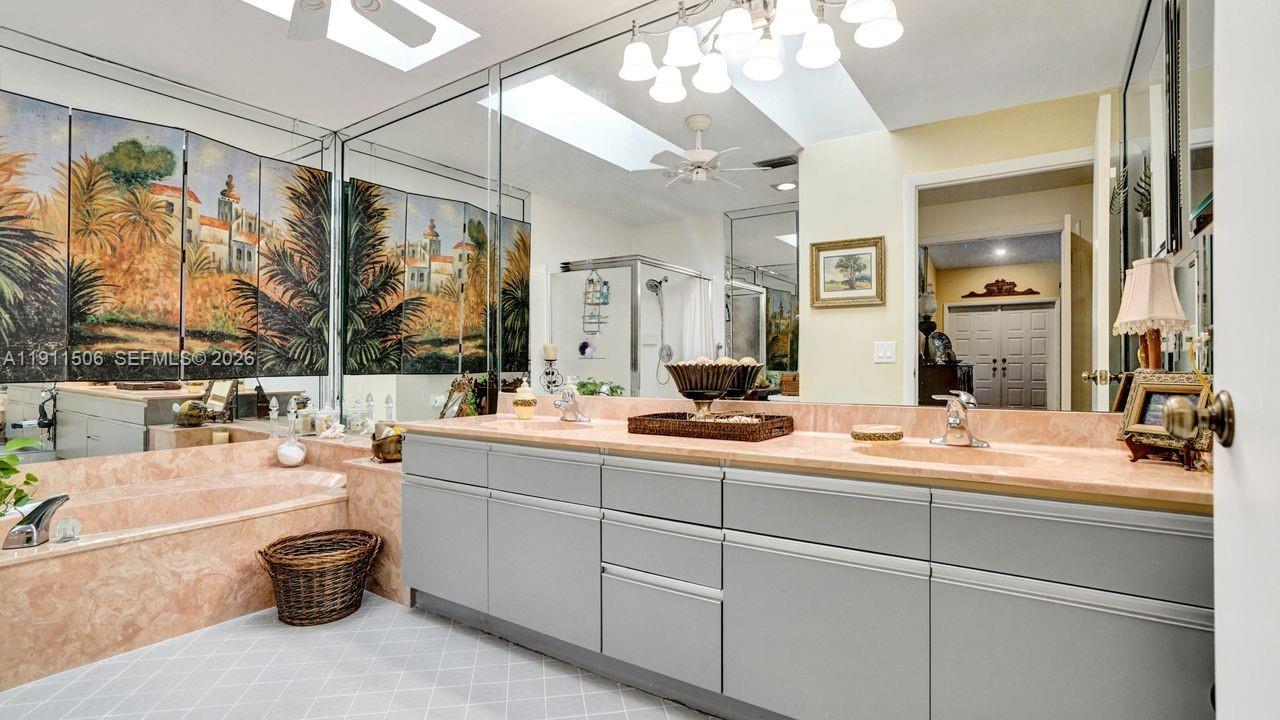 10858 White Aspen Lane Boca Raton, FL 33428 - Photo 28 of 72 a bathroom with a sink double vanity