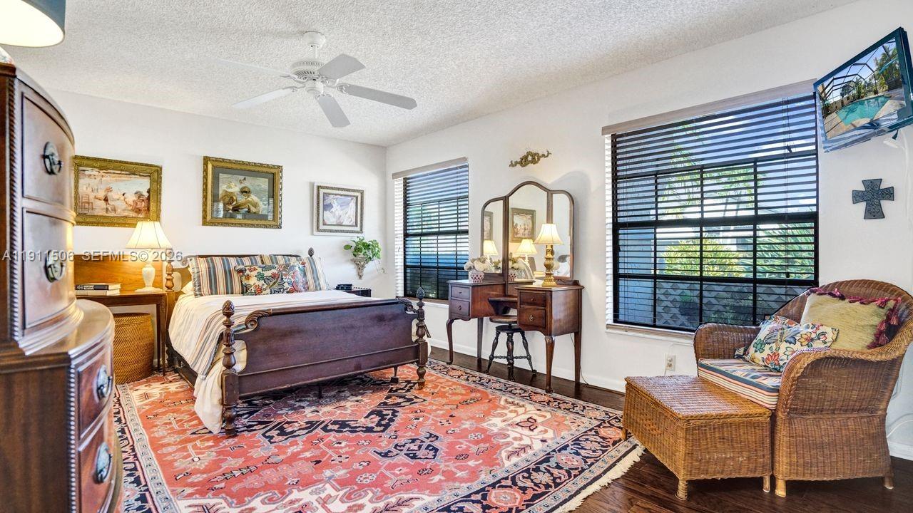10858 White Aspen Lane Boca Raton, FL 33428 - Photo 31 of 72 a living room with furniture and a rug