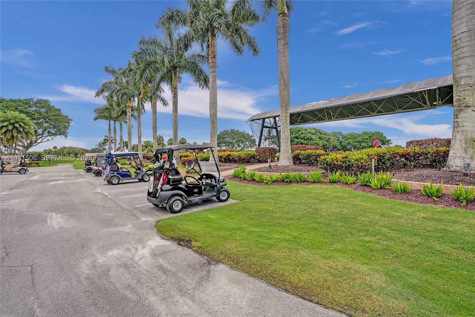 10858 White Aspen Lane Boca Raton, FL 33428 - Photo 62 of 72 a view of a yard with cars