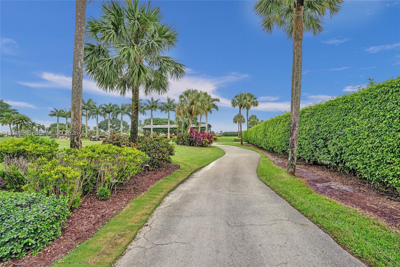 10858 White Aspen Lane Boca Raton, FL 33428 - Photo 64 of 72 a view of a garden with a fountain