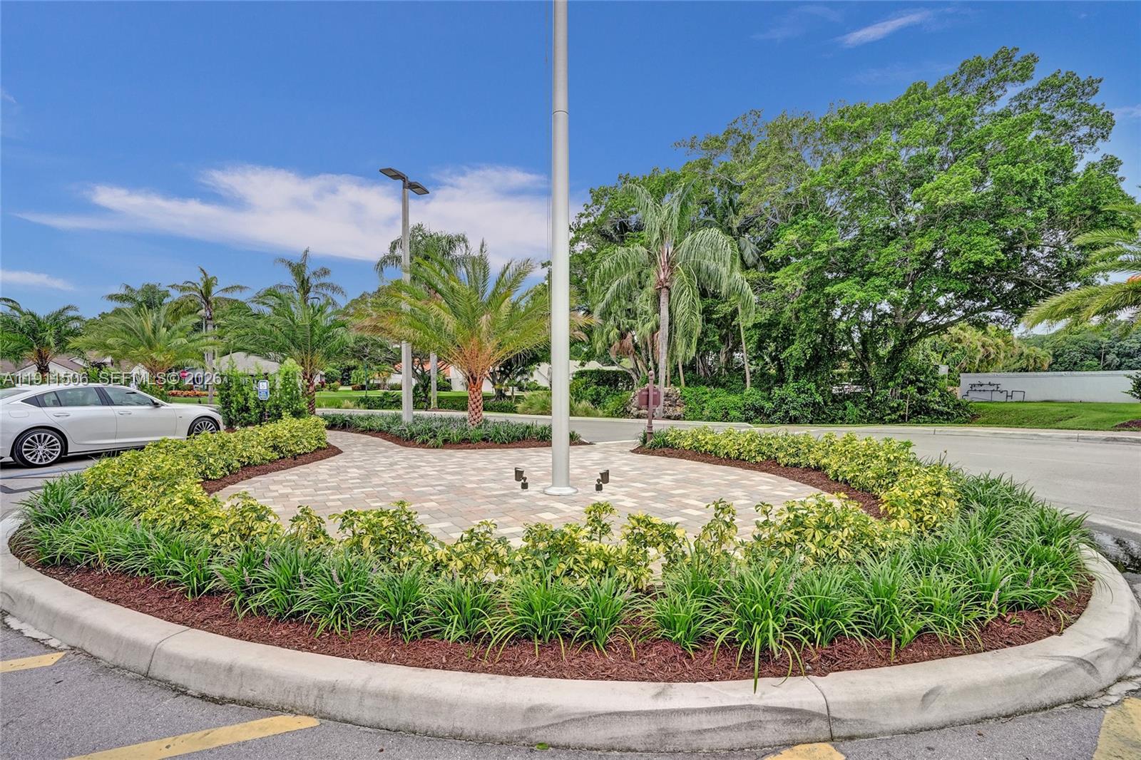 10858 White Aspen Lane Boca Raton, FL 33428 - Photo 71 of 72 a view of a backyard