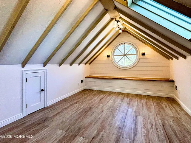 a view of entryway with wooden floor